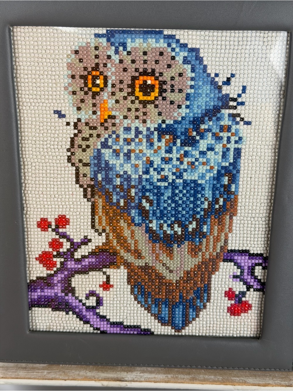 Diamond Art Kit Blue Owl Completed Framed under glass in gray frame.